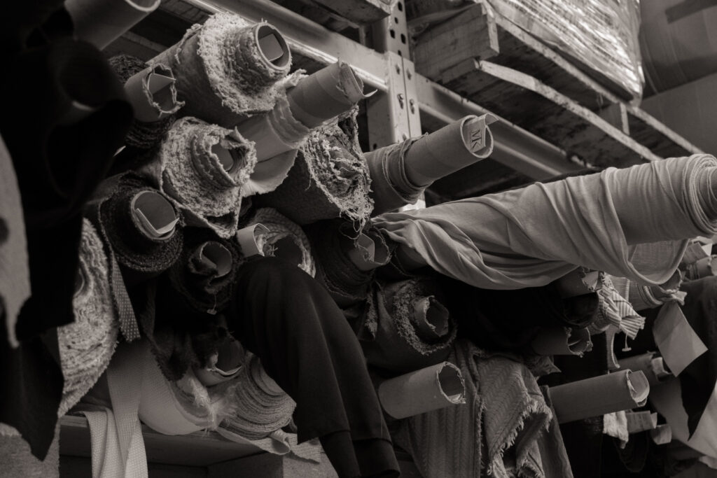 Surplus fabric rolls in a warehouse